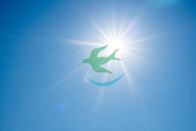 Direct ray of the sun in the blue sky